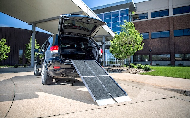 portable ramp used with vehicle