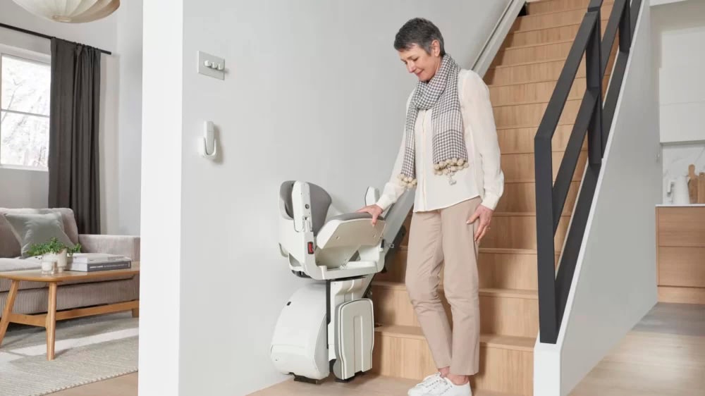 woman using stairlift